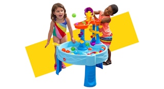kids playing at a water table