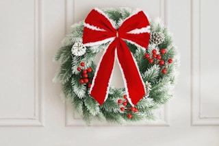 Pinkpum Lighted Christmas Wreath for Front Door Decor 16.5" hanging on a wall.