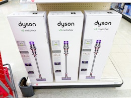 dyson v9 cordless vacuum sitting on a target shelf
