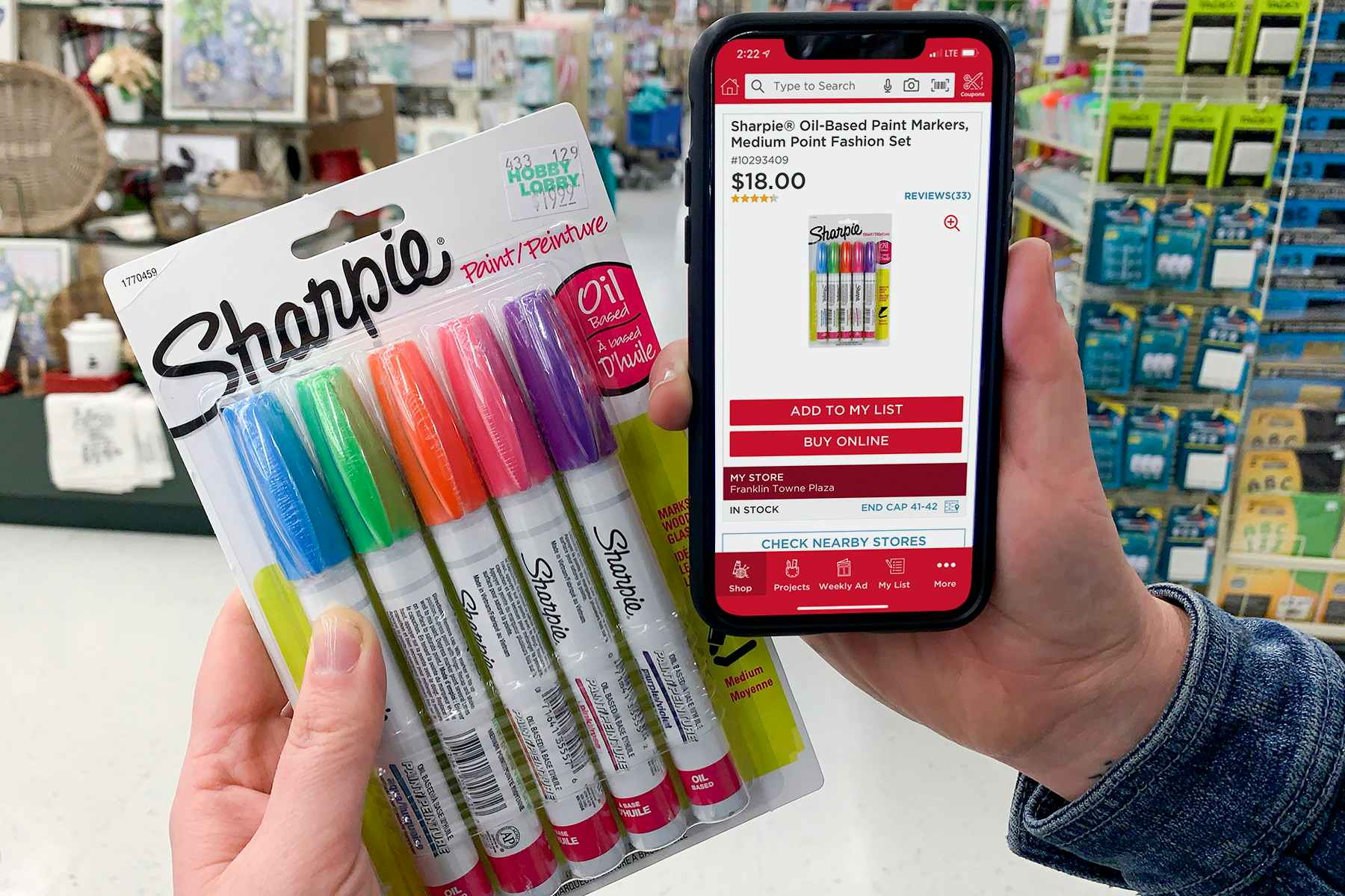 A cell phone showing the price of Sharpie Paint pens at Michaels with a pack of the same paint pens, featuring a higher price at Hobby Lo...