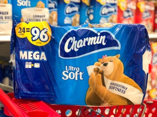 Toilet paper package stacked on corner of shopping cart