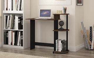 wooden computer desk in a room