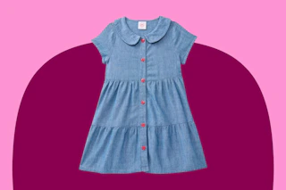 toddler denim dress on a pink background