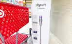 target cart parked in front of dyson vacuum