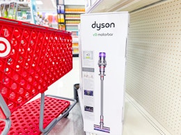target cart parked in front of dyson vacuum