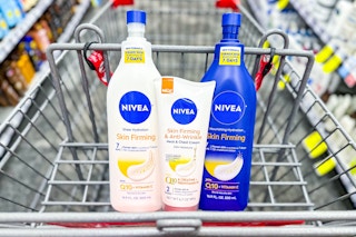 three nivea skin firming lotions in a shopping cart
