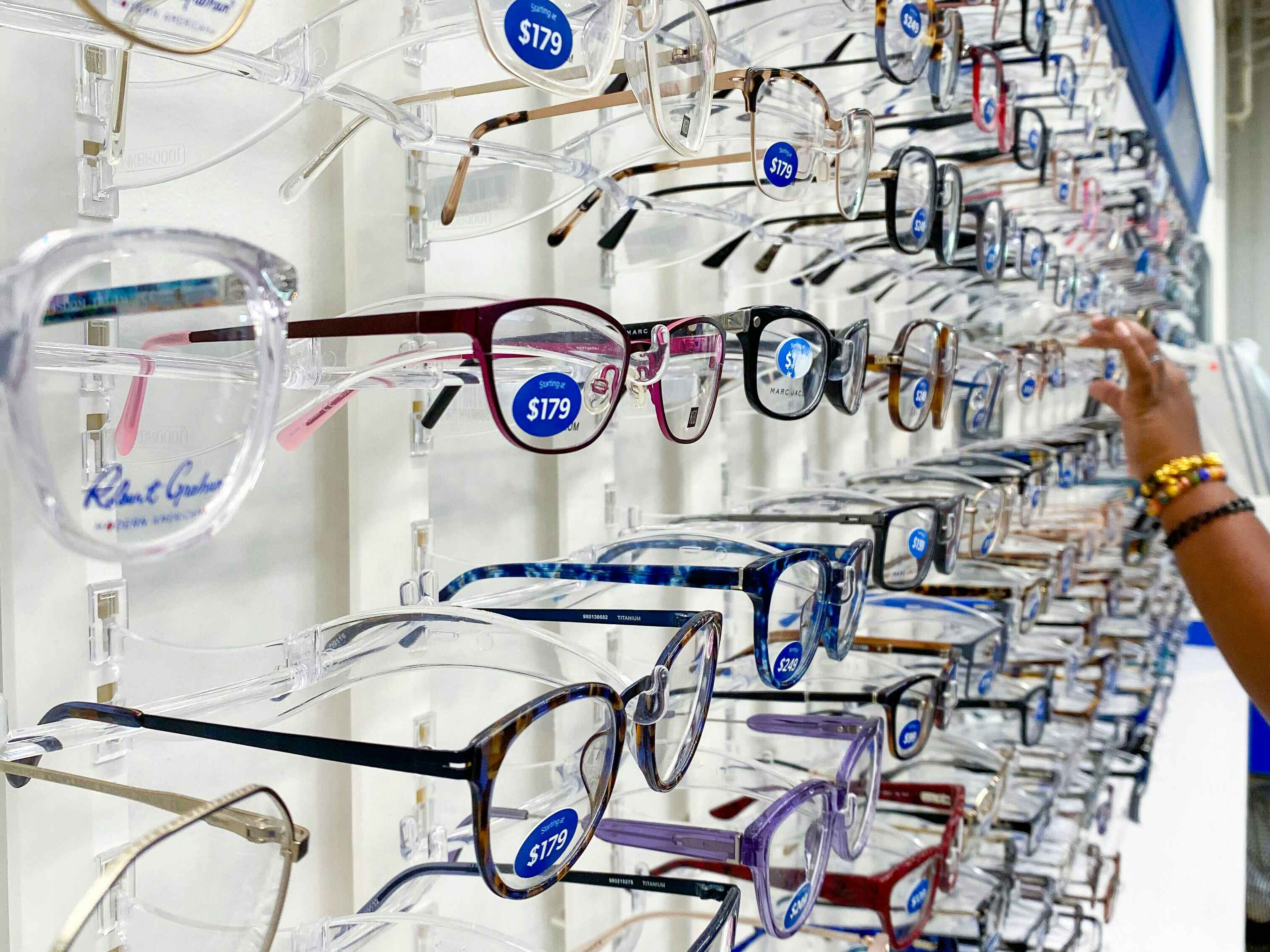 Eye glasses on a display wall in the Optical center at Sam's Club.