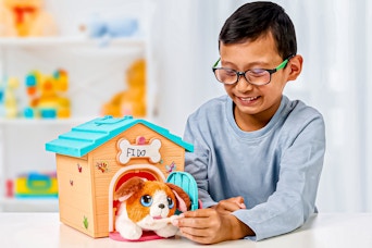 Lifestyle image of the Little Live Pets My Puppy's Home being played with by a child