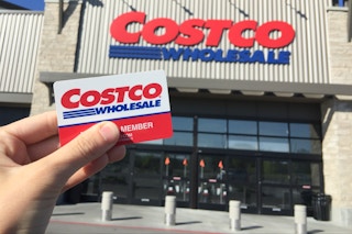 costco-membership-card-handheld at storefront 
