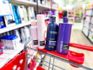 nexxus hair care items sitting on top a target cart