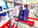 nexxus hair care items sitting on top a target cart