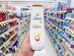 hand holding dove body wash in walgreens
