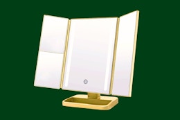 Stock image of a gold tri-fold Onyx LED mirror