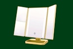 Stock image of a gold tri-fold Onyx LED mirror