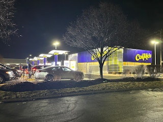 CosMc's restaurant with lots of cars parked at night, courtesy of AboutJT on X.