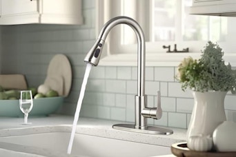 kitchen faucet running in sink