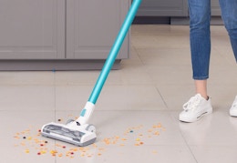 light blue and white stick vacuum