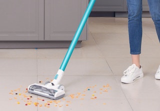 light blue and white stick vacuum