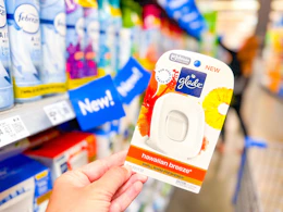 Glade Small Room Freshener held up in Walmart store
