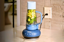 Lifestyle image the Ninja BlendBoss Personal Blender in the color blue