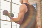 a man using dumbbells