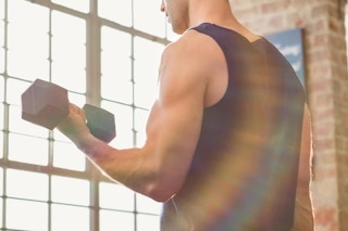 a man using dumbbells