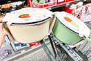 hand holding crofton awesome pots at aldi