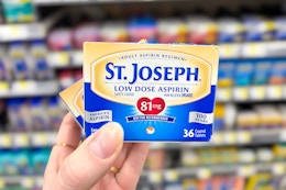 hand holding st. joseph aspirin