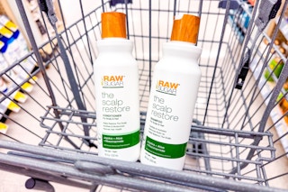 2 raw sugar shampoos in a cart