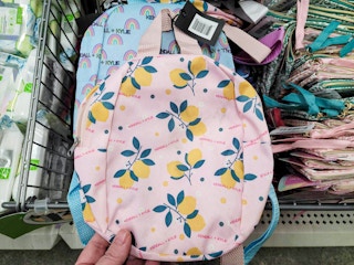pink bag with lemons on it