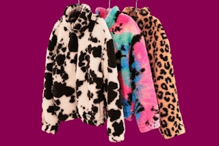 3 prints of the Justice Kids' Sherpa Pullovers (all hanging on clothes hangers)