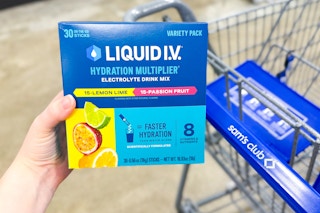 hand holding a box of liquid iv