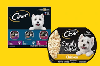 two packs of dog food on a yellow background