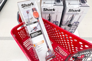 shark rocket stick vacuum in a target cart