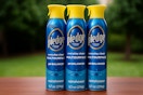 a three pack of pledge spray on table