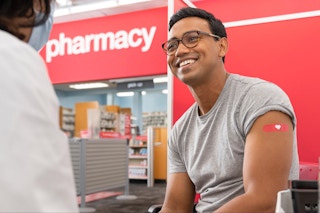 person at pharmacy who just received flu vaccine at cvs pharmacy