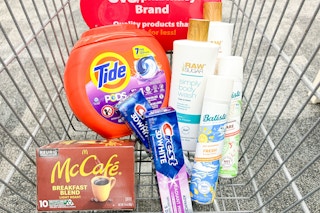 tide pods, mccafe kcup pods, crest toothpaste, batiste dry shampoo, and raw sugar body wash in a cart