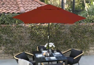 burgundy patio umbrella with a outdoor dining set