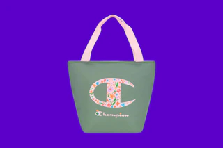a champion tote bag on a blue background