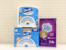 2 charmin and 1 puffs sitting on a target shelf