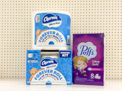 2 charmin and 1 puffs sitting on a target shelf