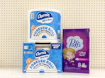 2 charmin and 1 puffs sitting on a target shelf