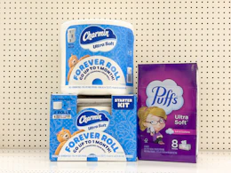 2 charmin and 1 puffs sitting on a target shelf