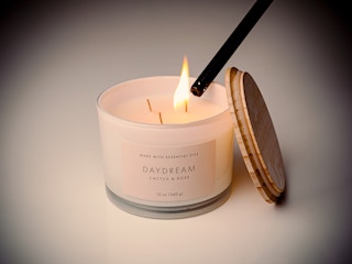 Target candle being lit with a lighter