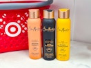 3 SheaMoisture Body Washes in front of Target shopping basket