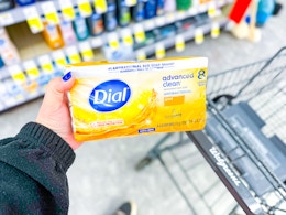 hand holding dial gold eight bar pack in walgreens