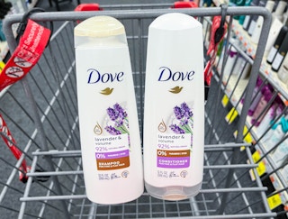 two Dove shampoo and conditioner bottles inside of cart