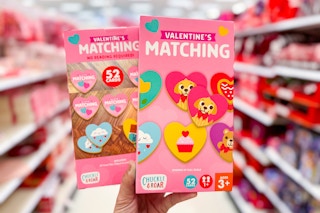 Two Chuckle & Roar Valentine's Day toys held up in center isle at Target