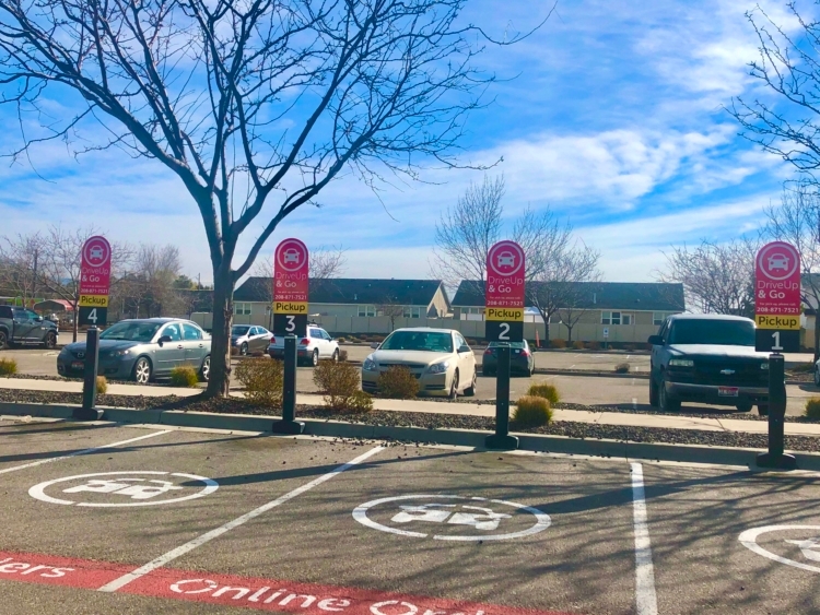 A grocery pickup parking spot outside an albertsons.