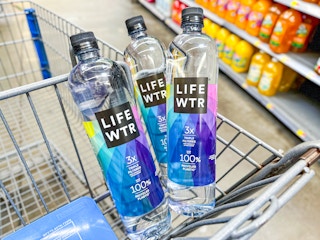 Three Life Wtr bottles in Walmart shopping cart
